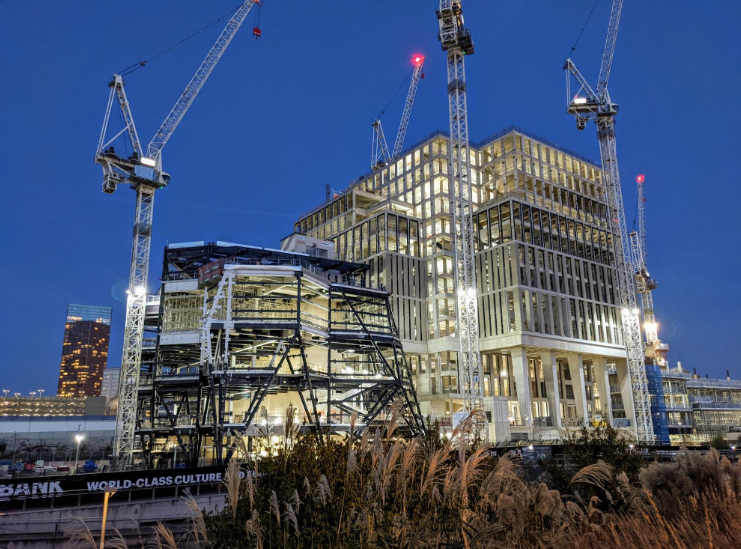 Large hospital construction site with cranes illustrating how much does it cost to build a hospital.