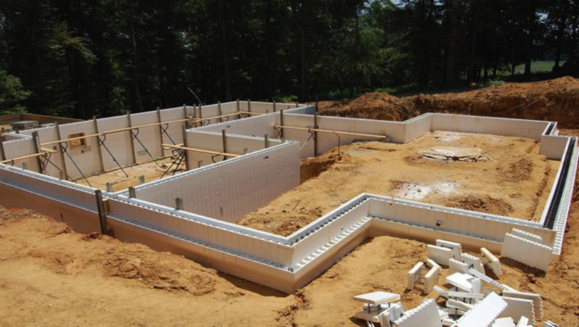 ICF foundation walls under construction for a quieter home build.