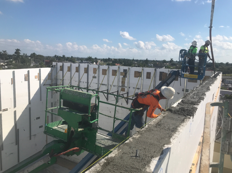 Construction crew working on Fox Blocks ICF tall wall movie theater.