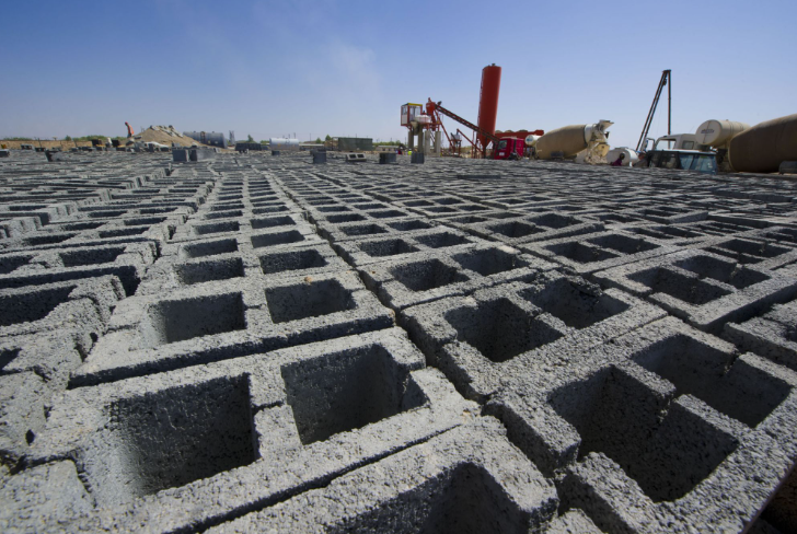 Stacked concrete masonry units (CMUs) at a construction site.
