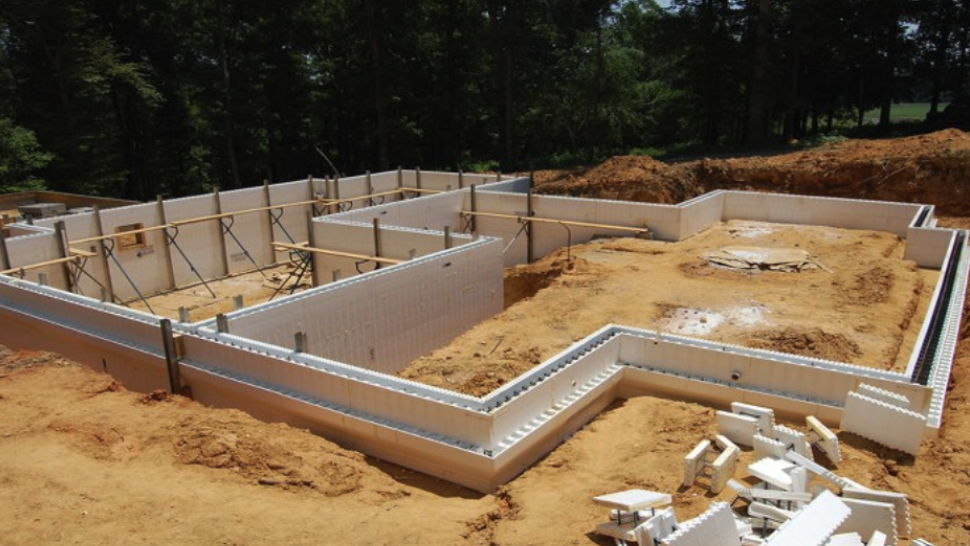 An image of a house showcasing exterior foundation covering ideas with a Fox Blocks ICF foundation.