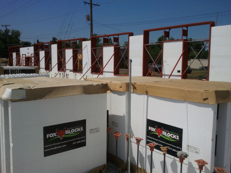 Boxes of Fox Blocks’ ICF blocks at a construction site.