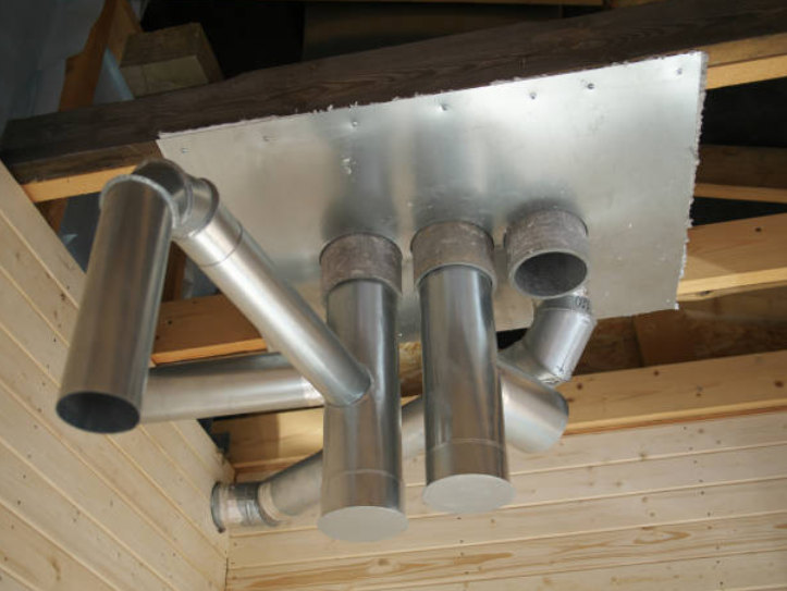 Residential ventilation ductwork installed during housing construction.