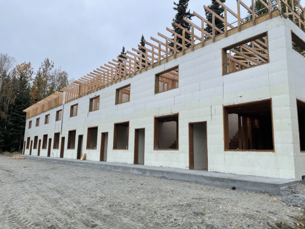 Alt Text: ICF housing being constructed.