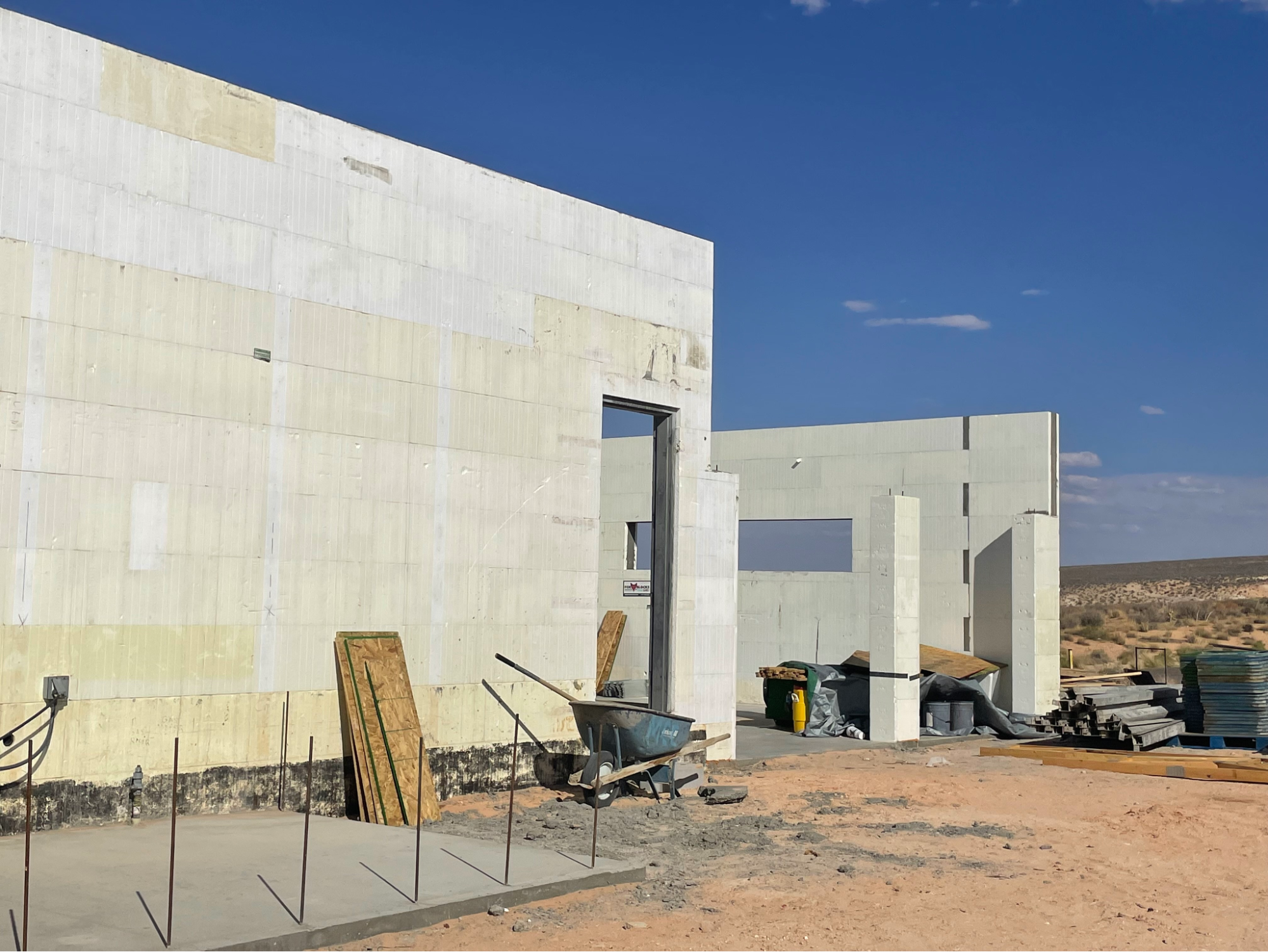 Insulated concrete form being used to build a warehouse