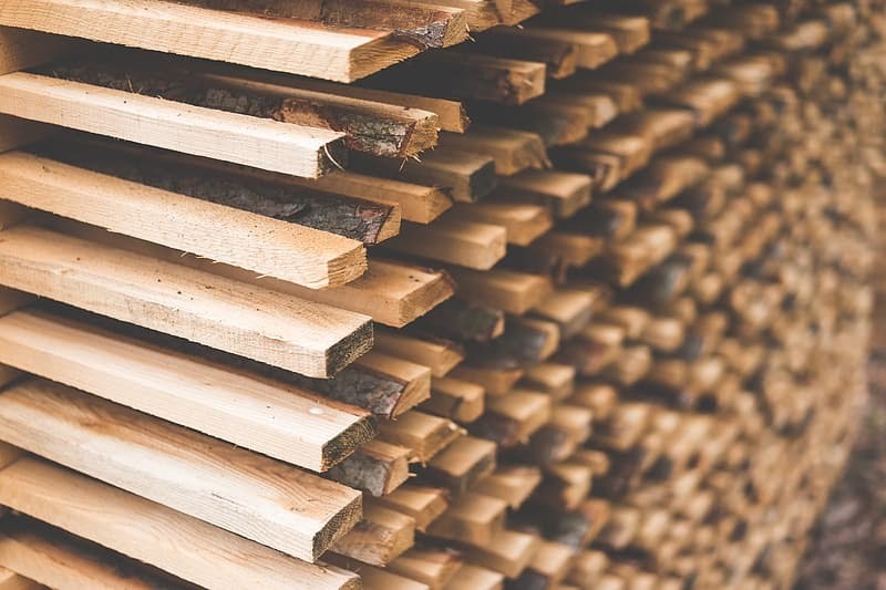 Freshly cut wood stacked for lumber air drying