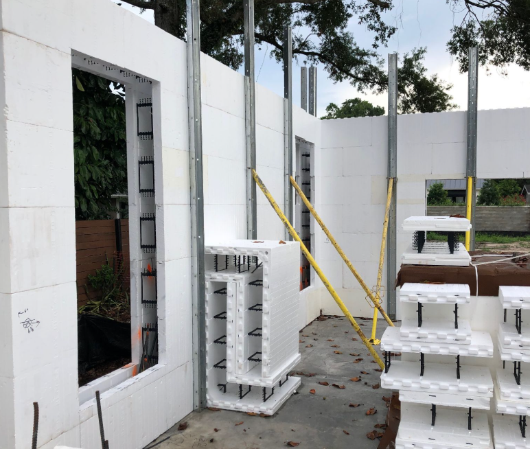 Fox Blocks ICF walls under construction with reinforced openings and bracing before concrete placement.