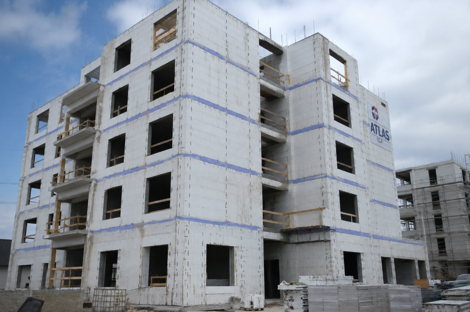 Multi-family building under construction using insulated concrete forms (ICFs).